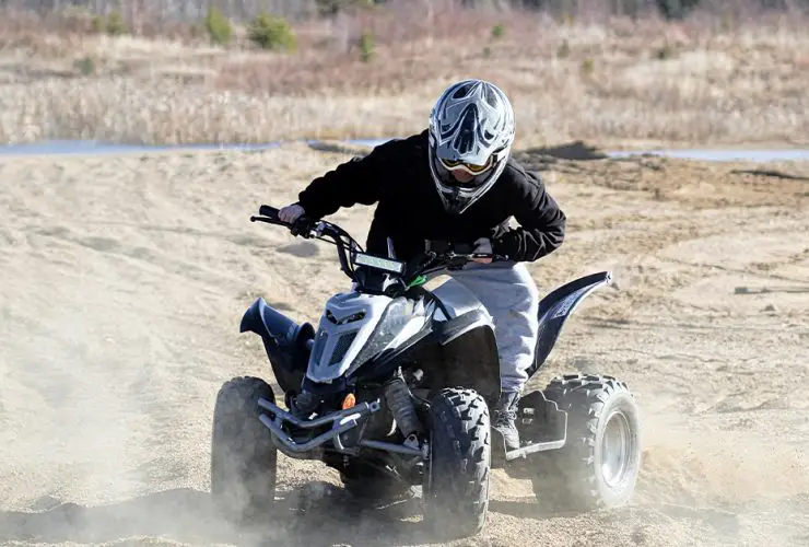 A young ATV rider on a Kazuma 150cc