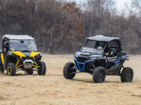 Two UTVs with different windshields